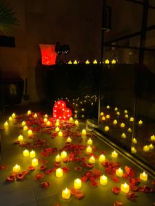 a bunch of candles are laying on the ground at LOFT w centrum z jacuzzi in Wrocław