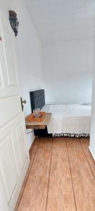 Μια τηλεόραση ή/και κέντρο ψυχαγωγίας στο Suítes da Praça Tiradentes