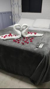 Postel nebo postele na pokoji v ubytování Fenix Dourado + 4 fotografie