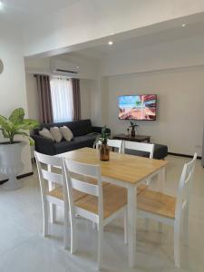 TV a/nebo společenská místnost v ubytování The Penthouse Suite