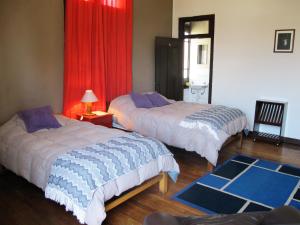 Postel nebo postele na pokoji v ubytování Park Hostel