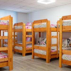 a group of bunk beds in a room at Aydeniz hostel in Chişinău