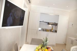 Kuchyň nebo kuchyňský kout v ubytování Marina Beach Suite Hotel