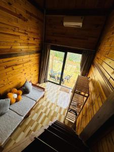 an overhead view of a room with a bed in a cabin at TopView Măng Đen in Kon Von Kla +28 photos