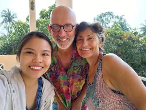a man and two women posing for a picture at Katie's homestay in Ðông Mỹ (2)