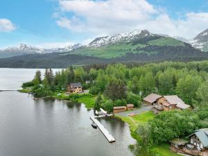 an aerial view of a resort on a lake with mountains at Bear Lake Lodgings B&B in Seward