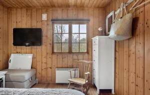TV o dispositivi per l'intrattenimento presso Awesome Home In Askø With Wifi