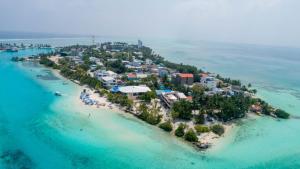 an aerial view of an island in the ocean at Nirili Villa in Dhiffushi