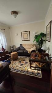 Posezení v ubytování Quarto en-suite Casa Cristina