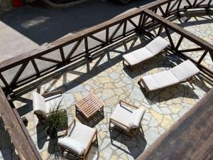 an overhead view of a patio with chairs and a table at Vip Apartments Kopaonik in Kopaonik