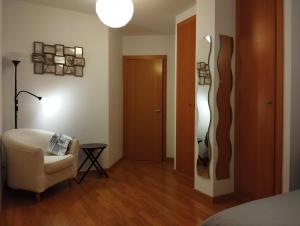 Ліжко або ліжка в номері Acogedor Apartamento Céntrico