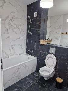 Koupelna v ubytování Green Apartment Iasi