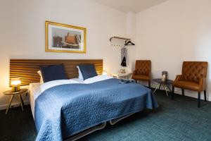 Katil atau katil-katil dalam bilik di Milling Hotel Ansgar