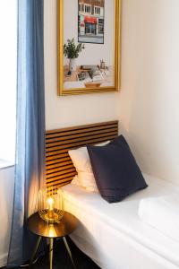 Katil atau katil-katil dalam bilik di Milling Hotel Ansgar