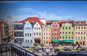 a view of a city with many colorful buildings at Apartament Baron II ***** in Jelenia Góra