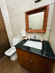 A bathroom at RAGHVENDRA HERITAGE