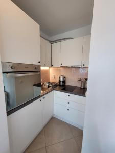 Kuchyň nebo kuchyňský kout v ubytování Apartment Biondić - Villa Sunce + 41 fotografií