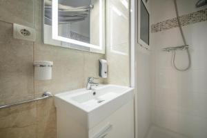 Koupelna v ubytování Apartamento a 100 metros de la playa