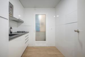 Kuchyň nebo kuchyňský kout v ubytování Apartamento a 100 metros de la playa