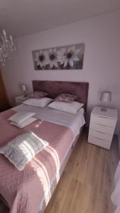 Posteľ alebo postele v izbe v ubytovaní Apartment Vestibul Inn