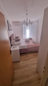 Postel nebo postele na pokoji v ubytování Apartment Vestibul Inn