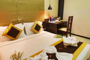 Postel nebo postele na pokoji v ubytování Hotel Durene + 16 fotografií