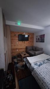 Postel nebo postele na pokoji v ubytování Apartman A&J 2