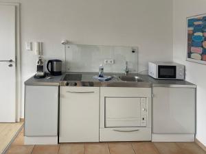 Η κουζίνα ή μικρή κουζίνα στο Komfortables Ferienapartment in Oldenburg