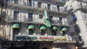 a building with a hotel samarahapsstration on it at SAMIR HOTEL in Alger