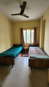 Ein Bett oder Betten in einem Zimmer der Unterkunft SheStay - Homestay by Women, for Women
