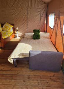 Ένα ή περισσότερα κρεβάτια σε δωμάτιο στο Camping de la touche