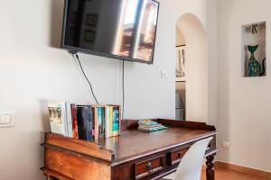 Telewizja i/lub zestaw kina domowego w obiekcie San Giorgio Apartment