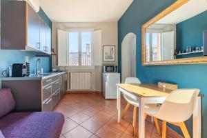 Kuchnia lub aneks kuchenny w obiekcie San Giorgio Apartment