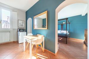 Łóżko lub łóżka w pokoju w obiekcie San Giorgio Apartment