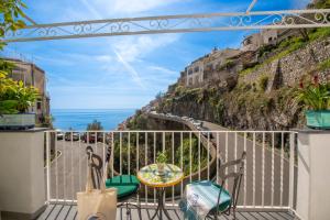 a balcony with a view of the amalfi coast at Casa Carmela in Positano
