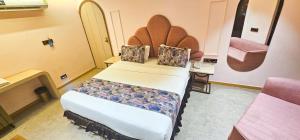 Postel nebo postele na pokoji v ubytování Hotel Nova Bling