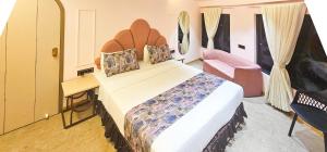 Postel nebo postele na pokoji v ubytování Hotel Nova Bling