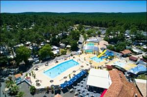 an aerial view of a resort with a swimming pool at A la brise du Ferret - Camping les Embruns in Lège-Cap-Ferret