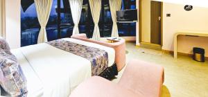 Postel nebo postele na pokoji v ubytování Hotel Nova Bling