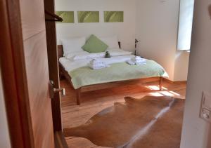 Voodi või voodid majutusasutuse Unique Hotel Fusio toas