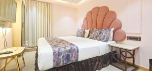 Postel nebo postele na pokoji v ubytování Hotel Nova Bling