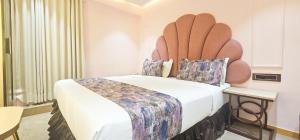 Postel nebo postele na pokoji v ubytování Hotel Nova Bling
