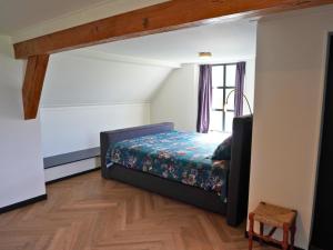 Postel nebo postele na pokoji v ubytování B&B Catharinenburg Golf & Wellness