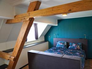 Postel nebo postele na pokoji v ubytování B&B Catharinenburg Golf & Wellness