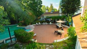 Zahrada ubytování WHome Family Paradise, Exquisite Retreat for Holidays