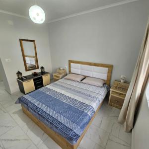 En eller flere senge i et værelse på Ilyrian Apartment