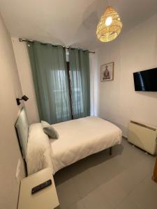 Postel nebo postele na pokoji v ubytování Sueños de Lorca Guest House
