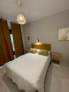 Postel nebo postele na pokoji v ubytování Sueños de Lorca Guest House