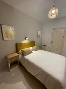 Postel nebo postele na pokoji v ubytování Sueños de Lorca Guest House