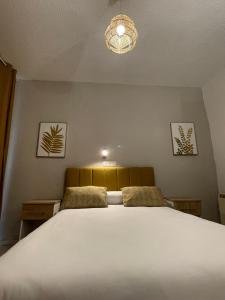 Postel nebo postele na pokoji v ubytování Sueños de Lorca Guest House